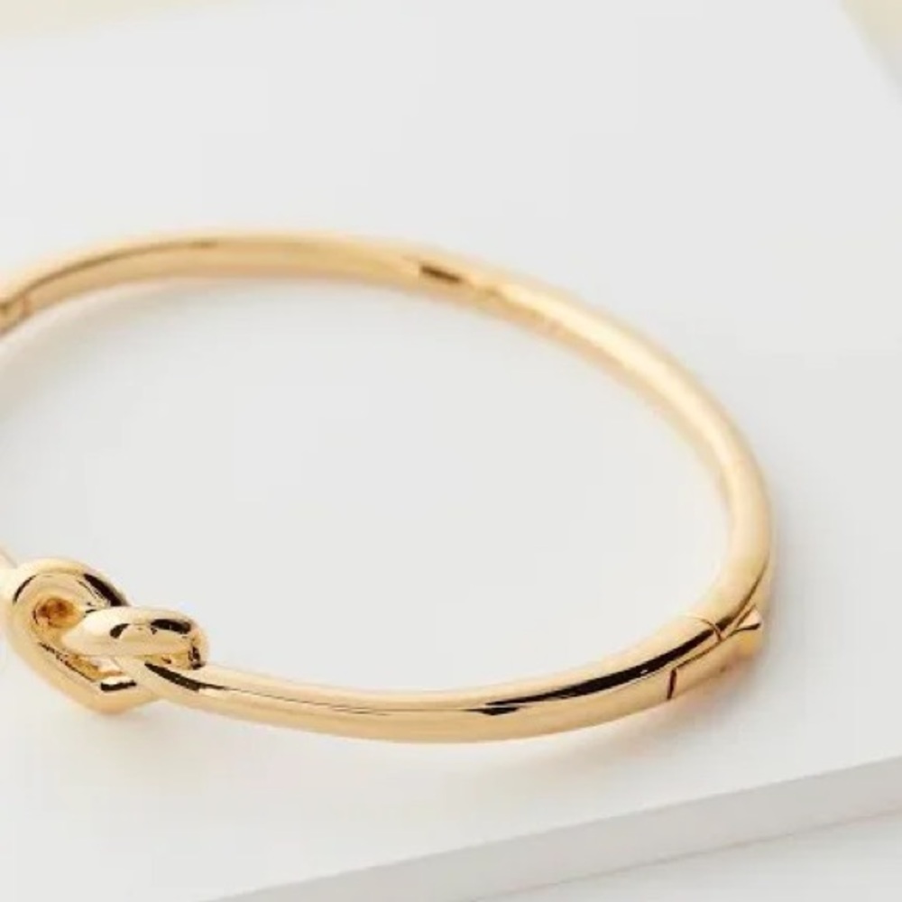 NWOT Kate Spade ♠️ New York Loves Me Knot Goldtone Bangle Bracelet - Picture 8 of 11